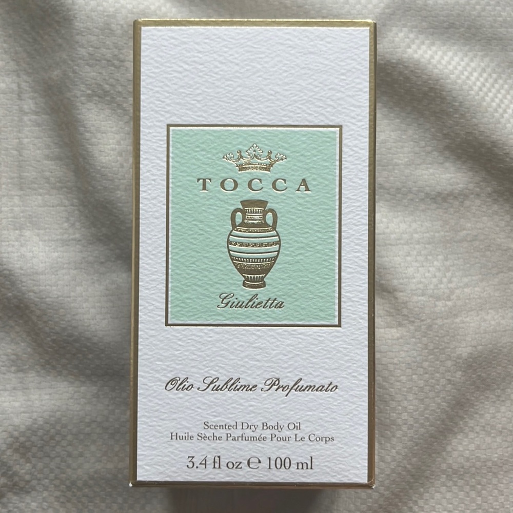 TOCCA dry body oil in the scent Giulietta
